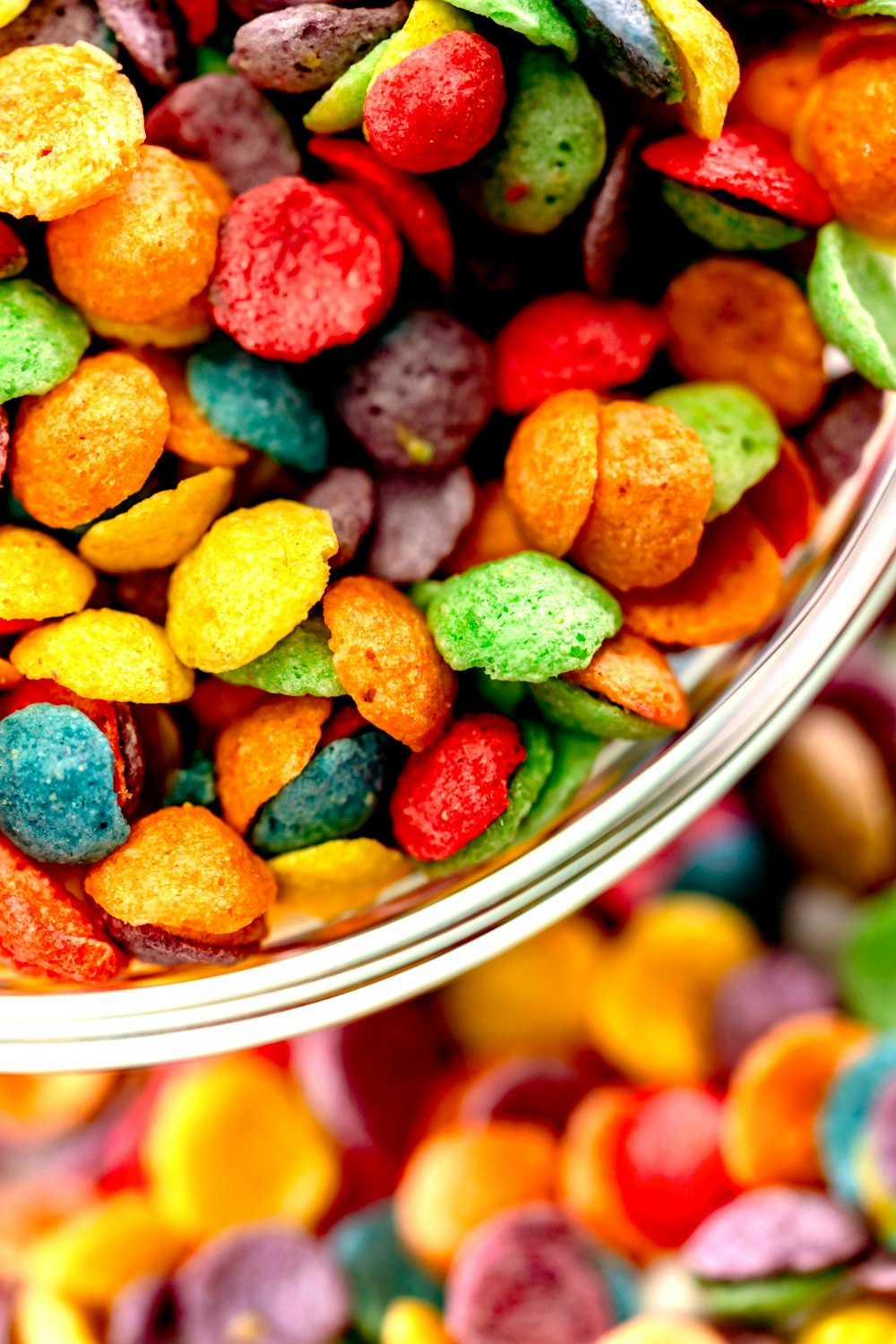 a bowl filled with lots of colorful candy