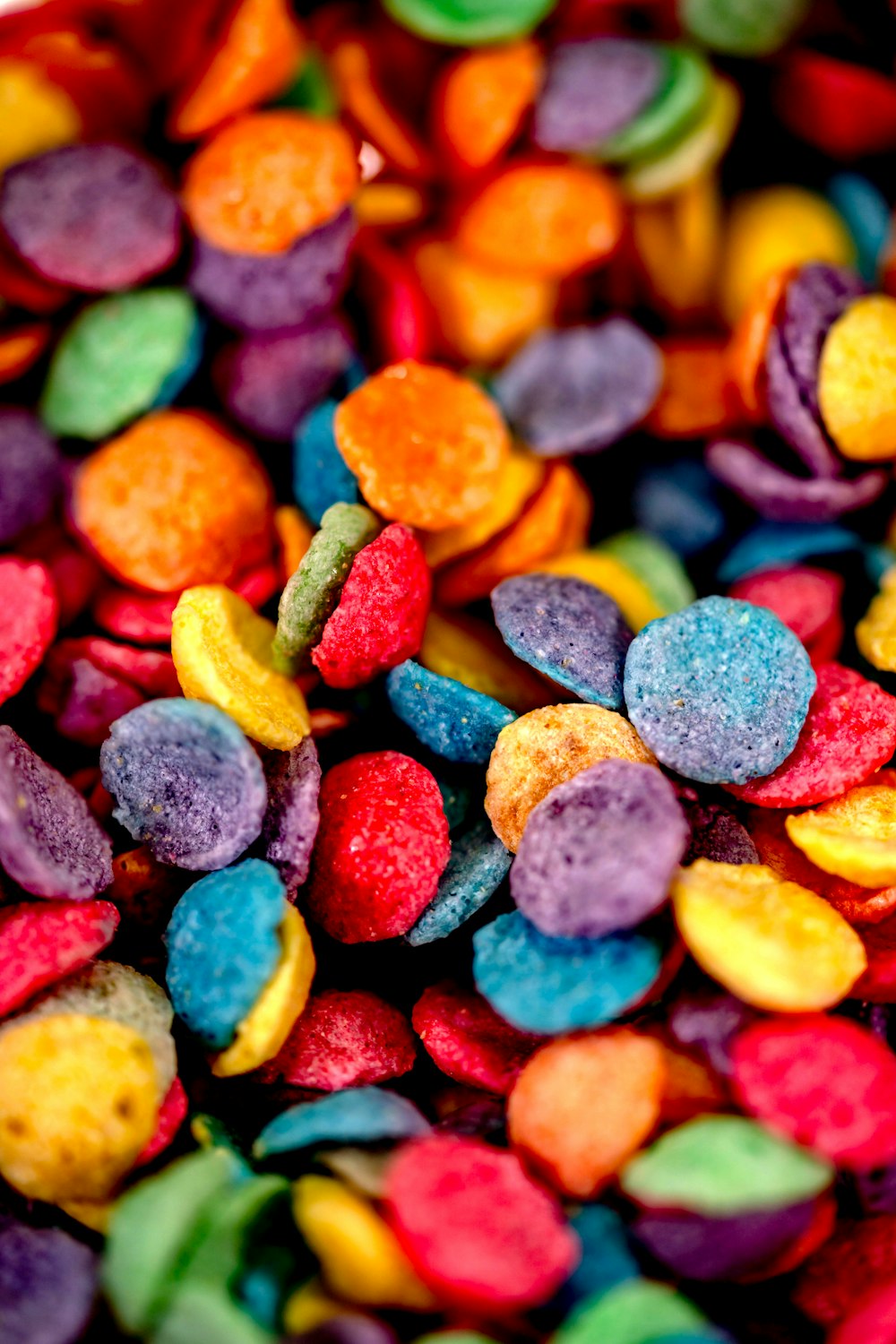 a close up of a bowl of candy