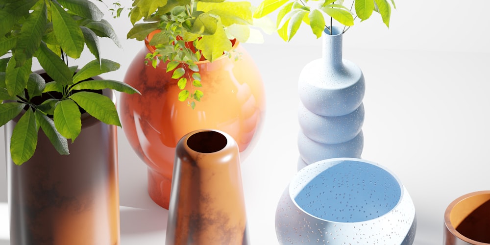 a group of vases sitting next to each other on a table