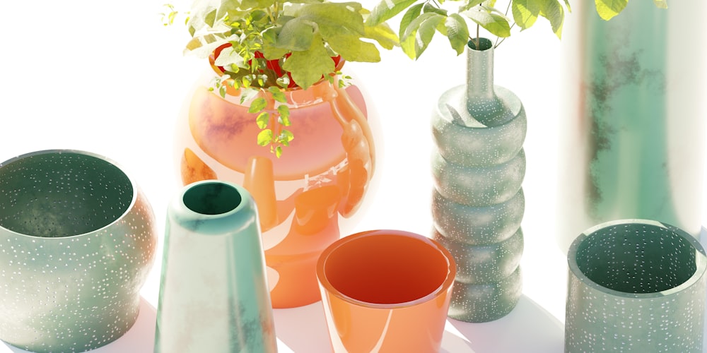 a group of vases sitting next to each other on a table