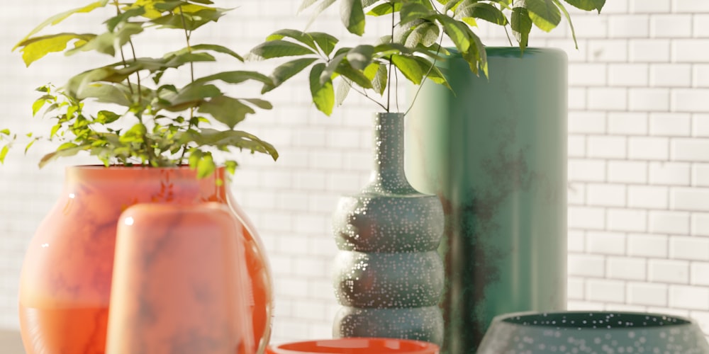 a group of vases sitting on top of a table