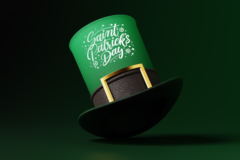 a green top hat with a gold buckle