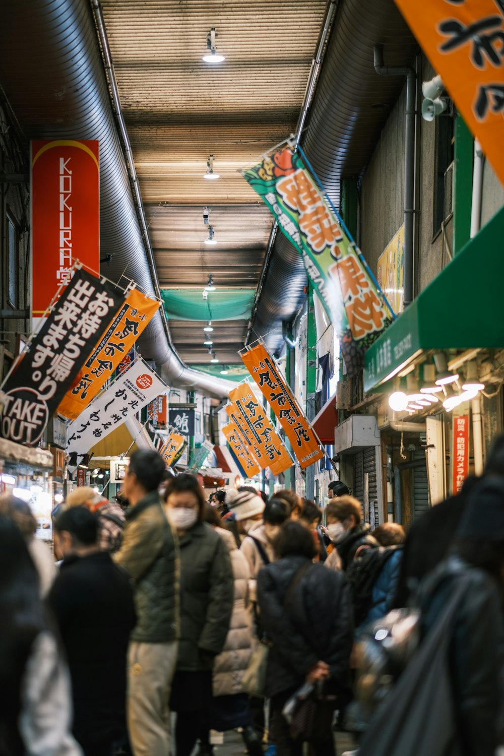 a group of people walking down a street