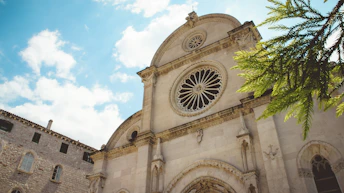 a large building with a clock on the front of it