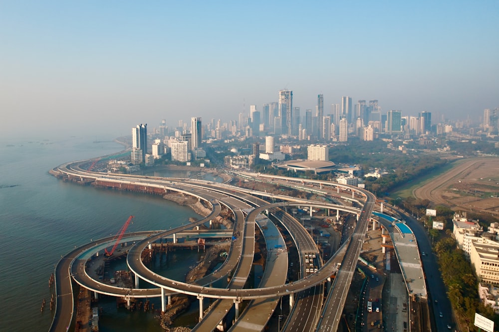 an aerial view of a highway and a city