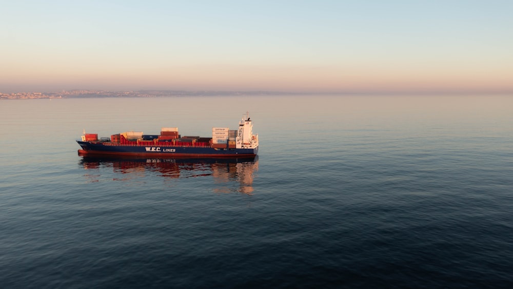 a large boat floating on top of a large body of water