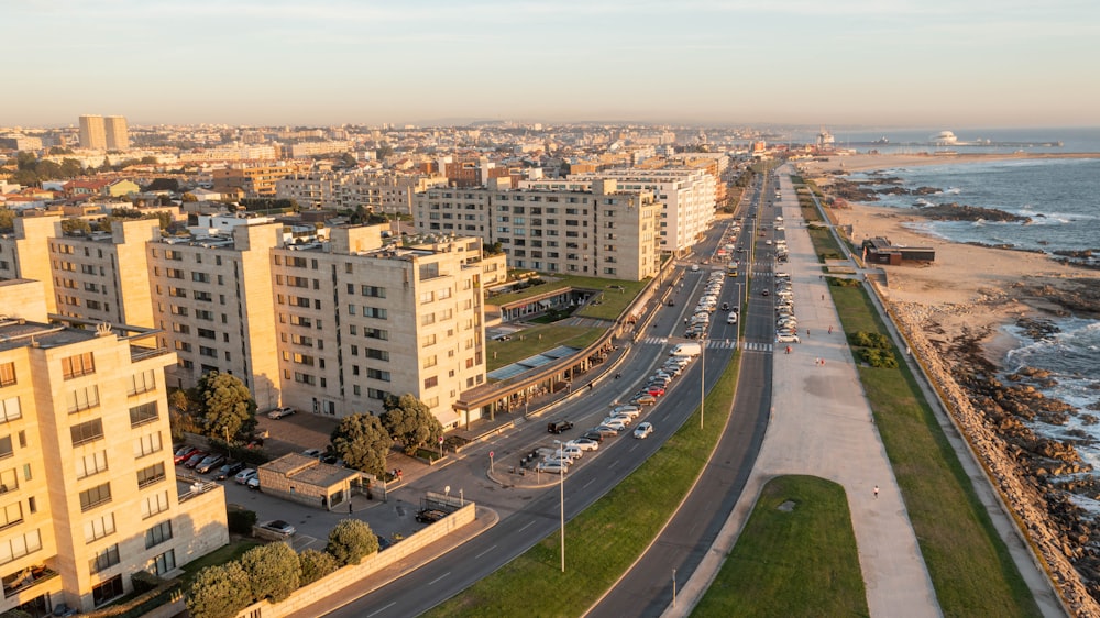 an aerial view of a city by the ocean