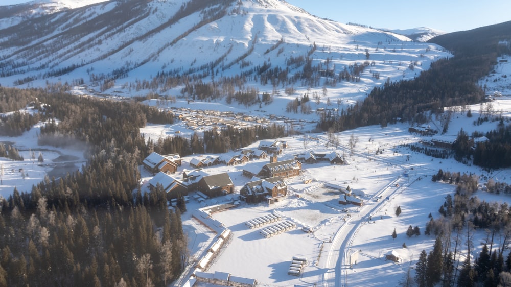 an aerial view of a ski resort in the mountains