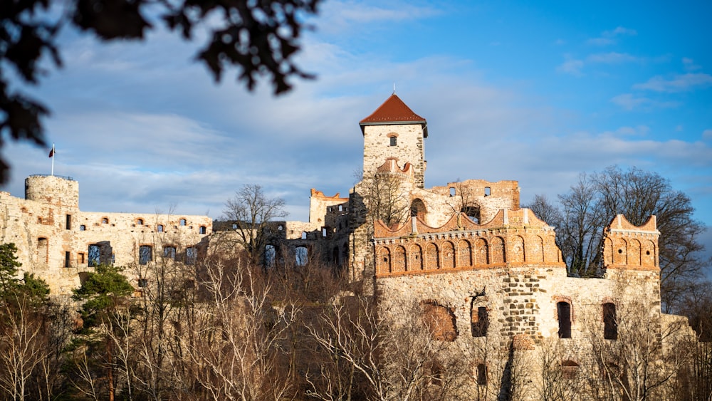 an old castle with a clock tower on top of it