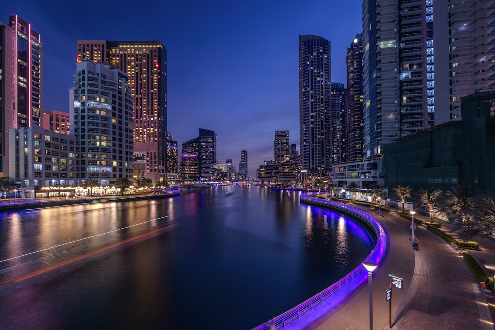 a view of a city at night from across the river