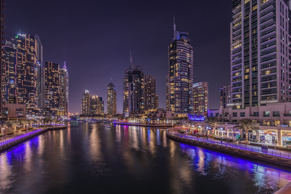 a river running through a city at night