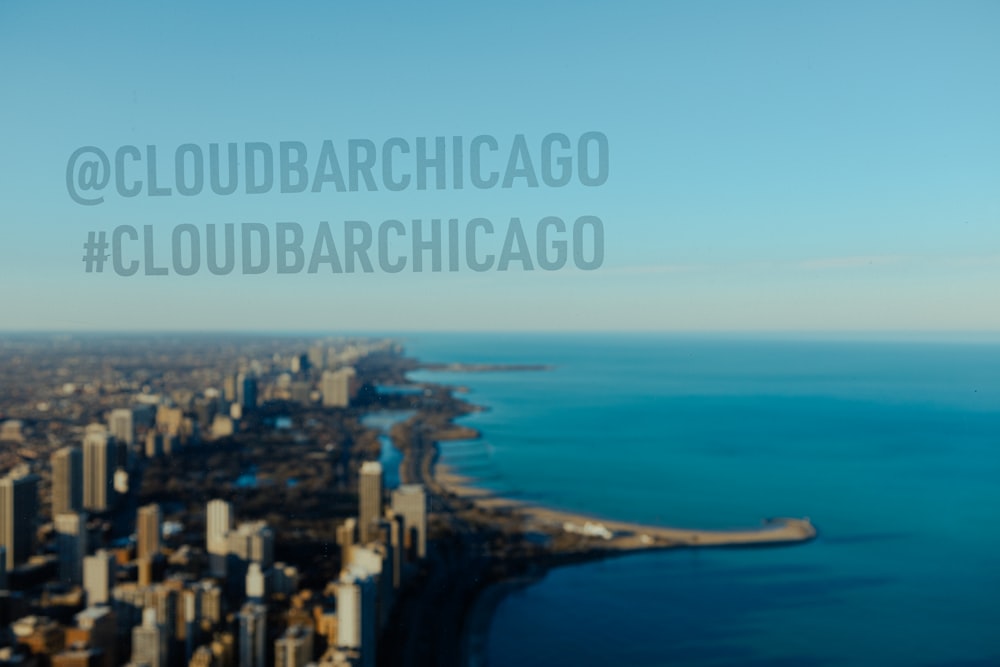 an aerial view of a city and a body of water