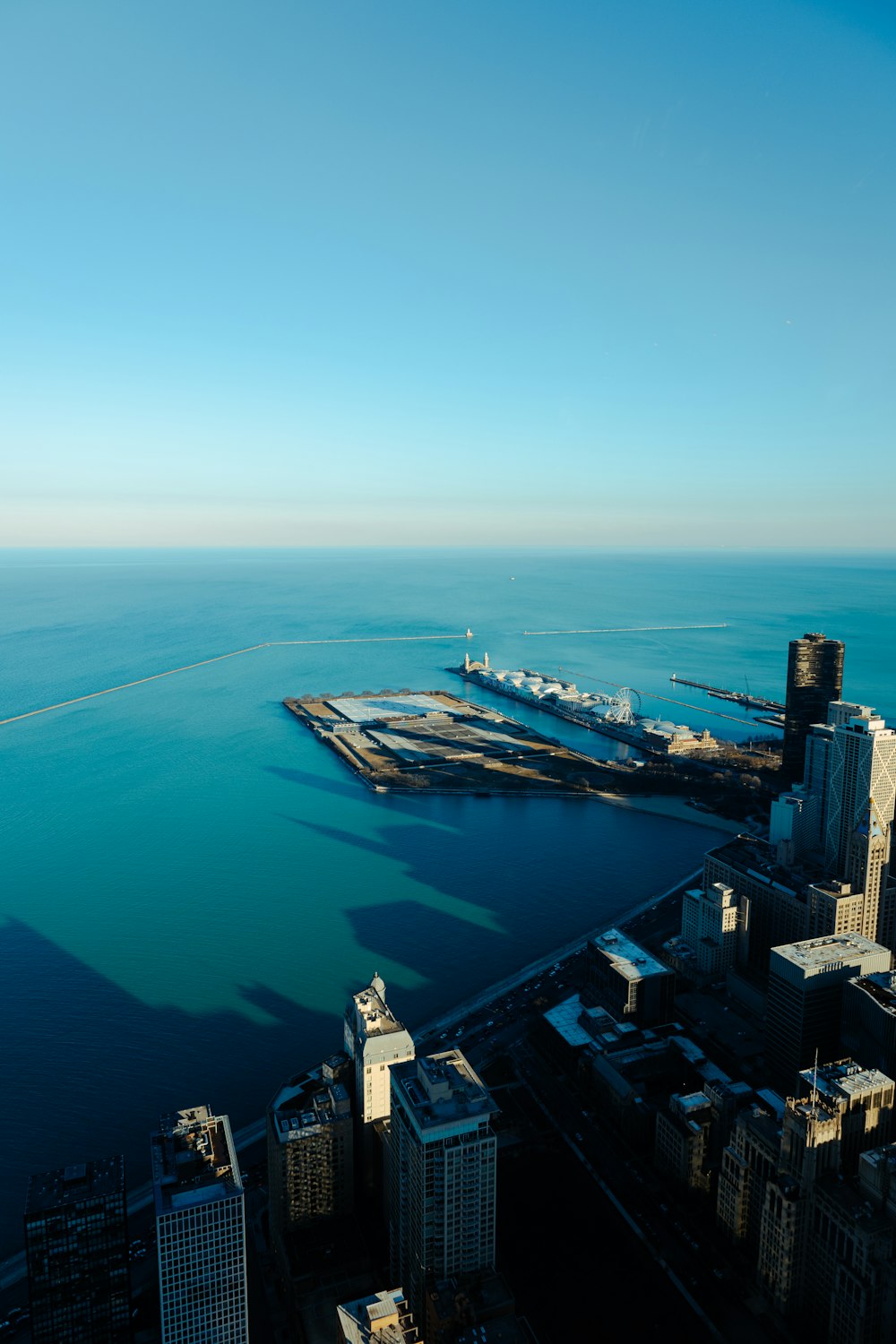 a large body of water surrounded by tall buildings