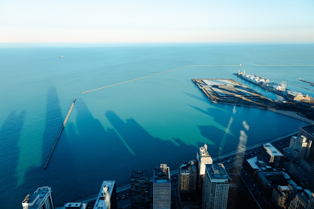 a large body of water surrounded by tall buildings