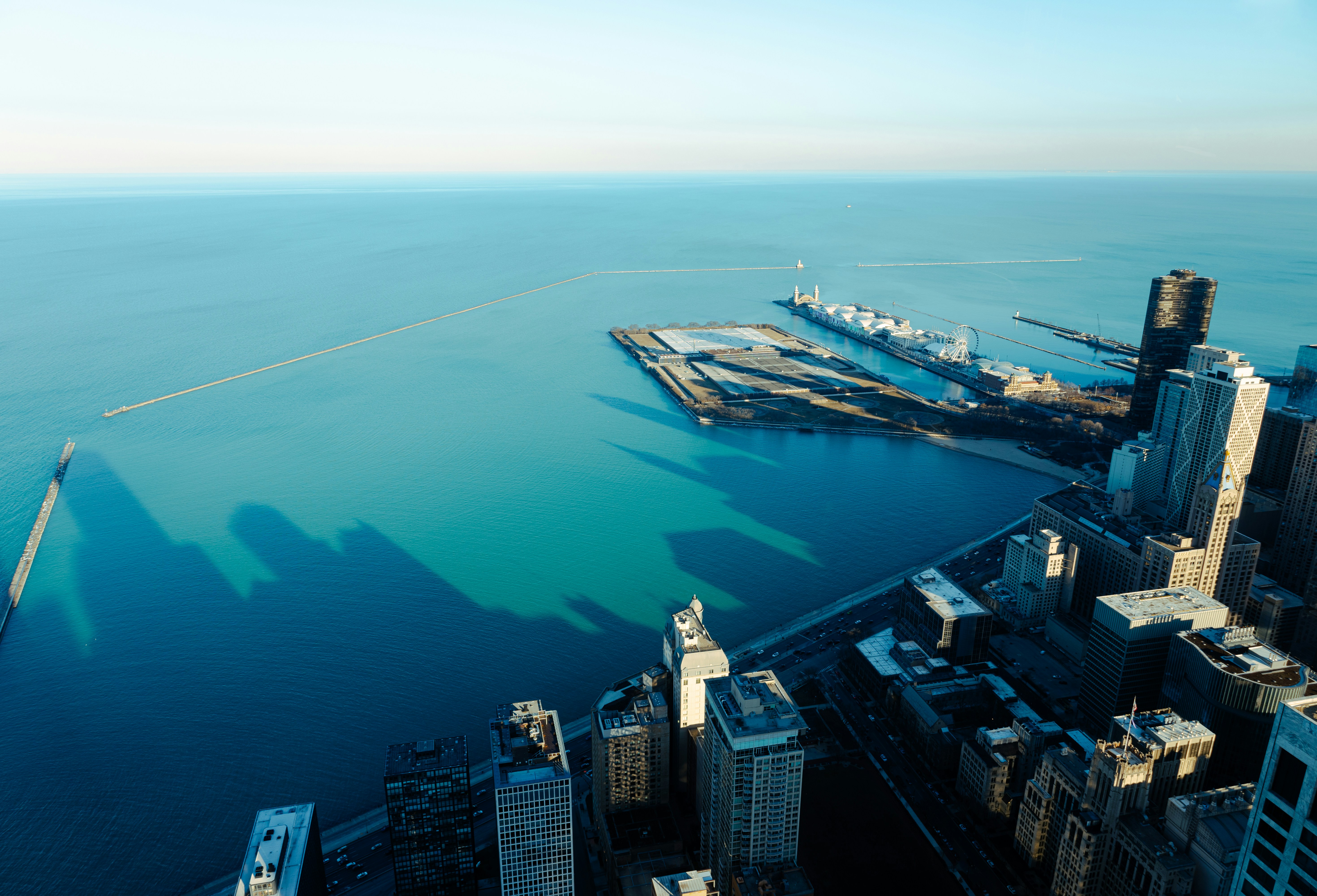 a large body of water surrounded by tall buildings