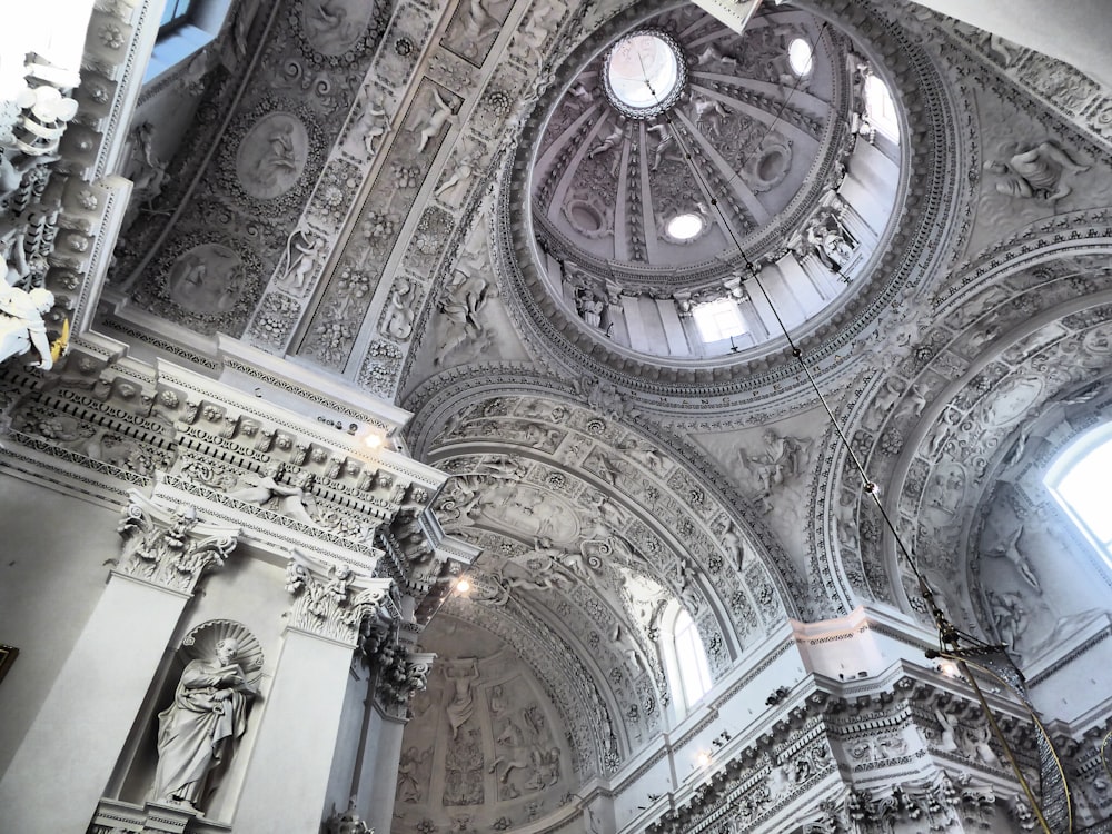 the ceiling of a large building with a dome