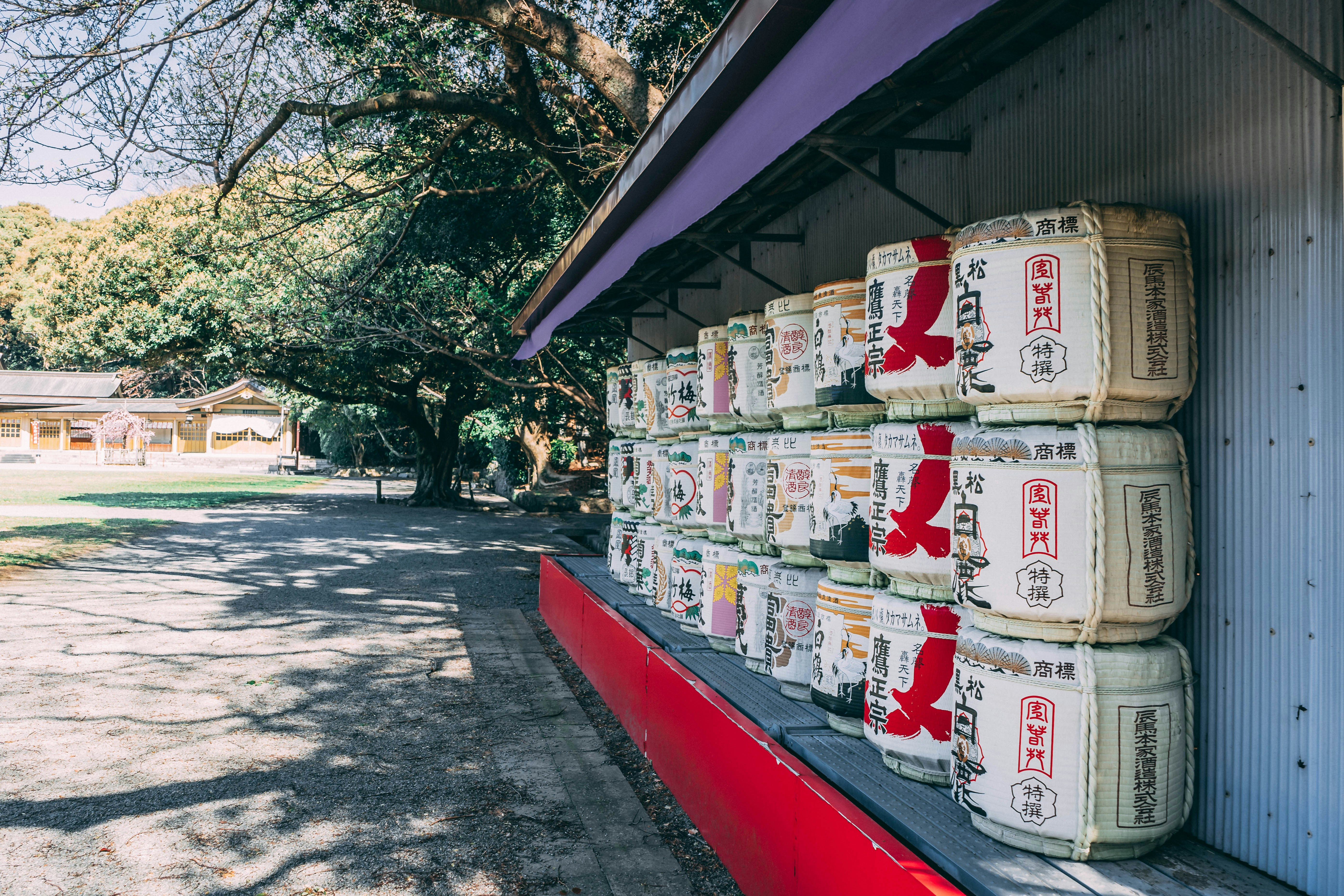 a bunch of containers are stacked up on a wall