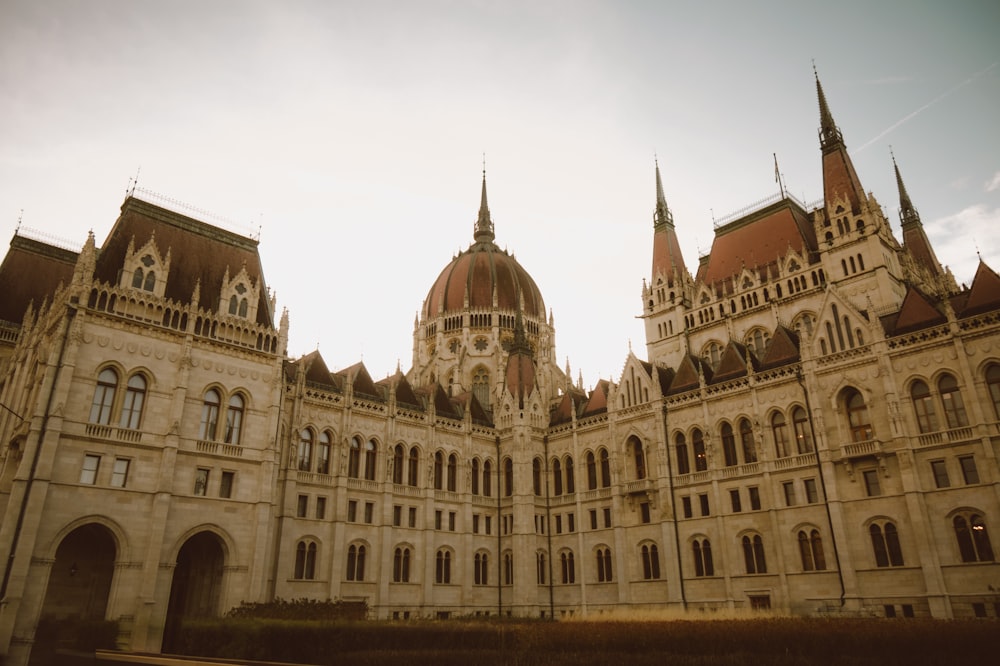 a large building with many windows and towers