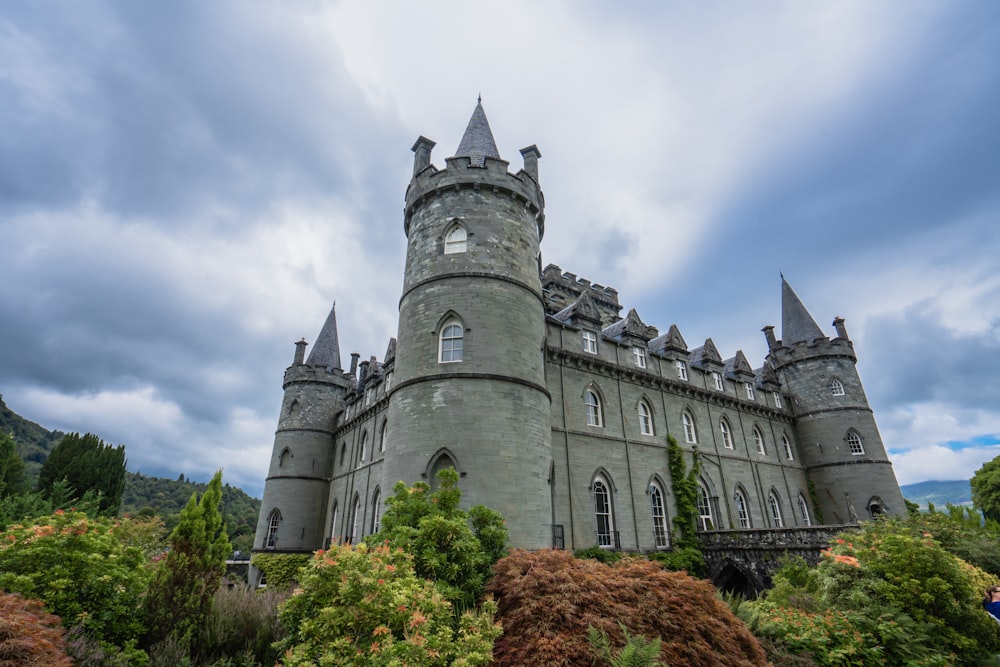 a large castle with a clock on the top of it