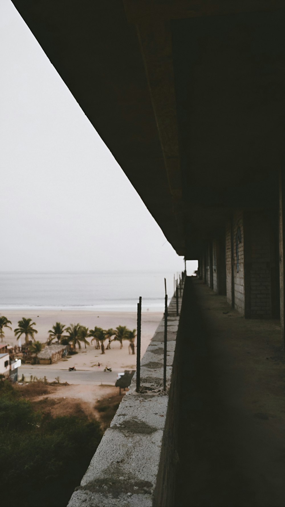 a view of a beach from a balcony