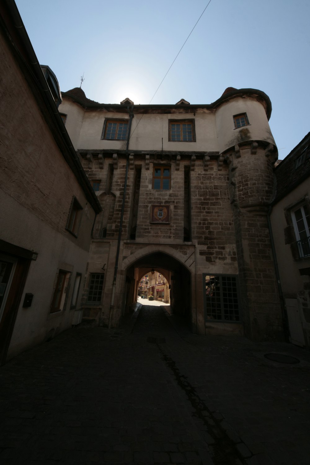 the sun shines brightly through the windows of an old building