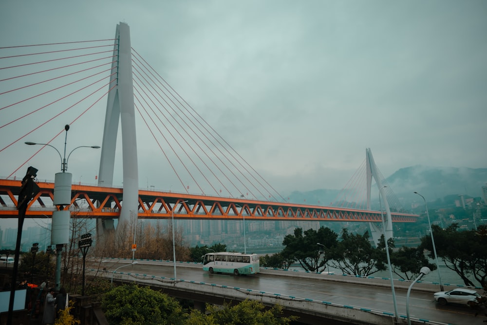 a view of a bridge with cars driving on it