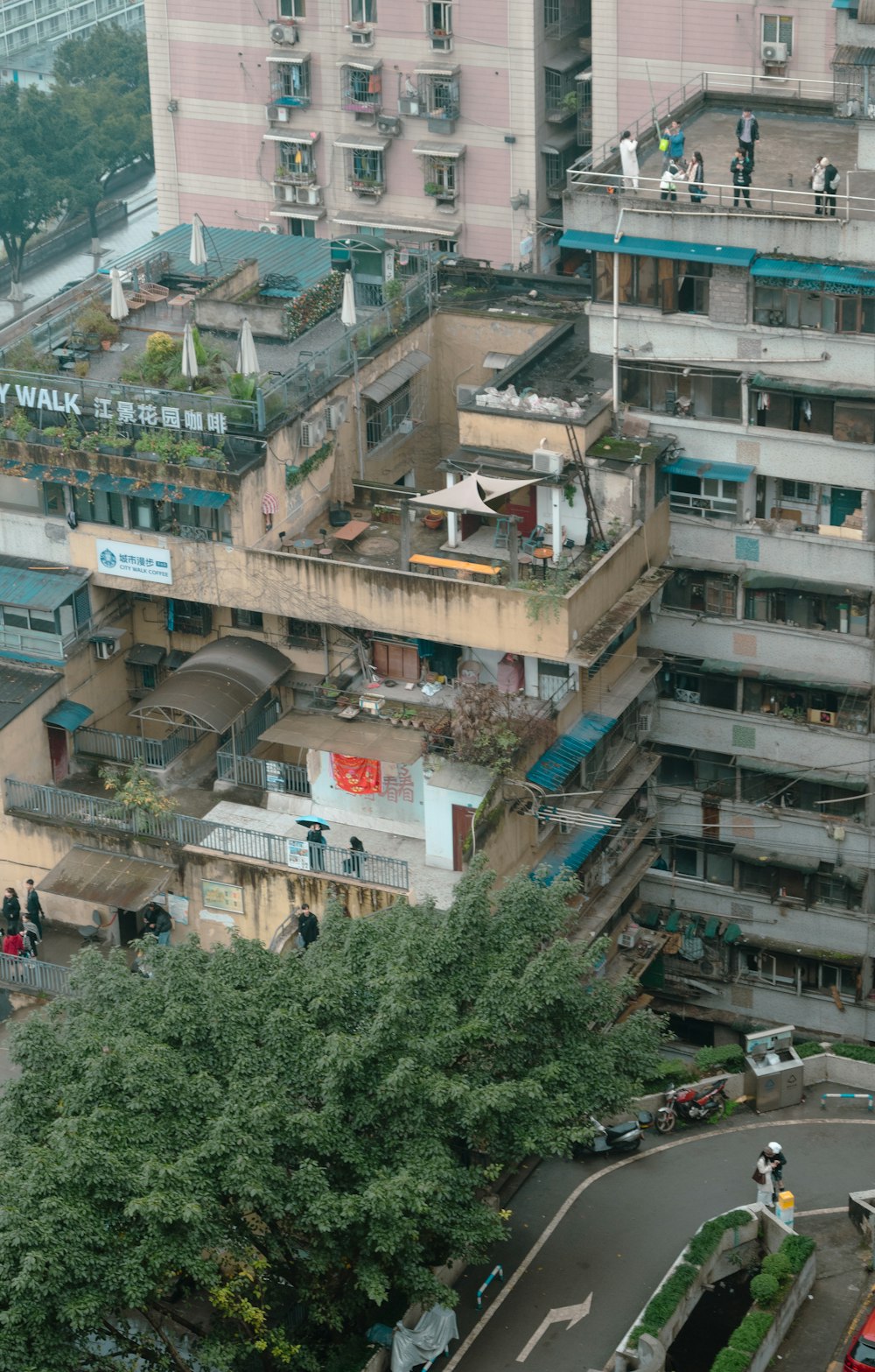 an aerial view of a city with tall buildings