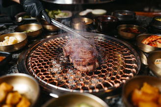 a grill that has some food on it