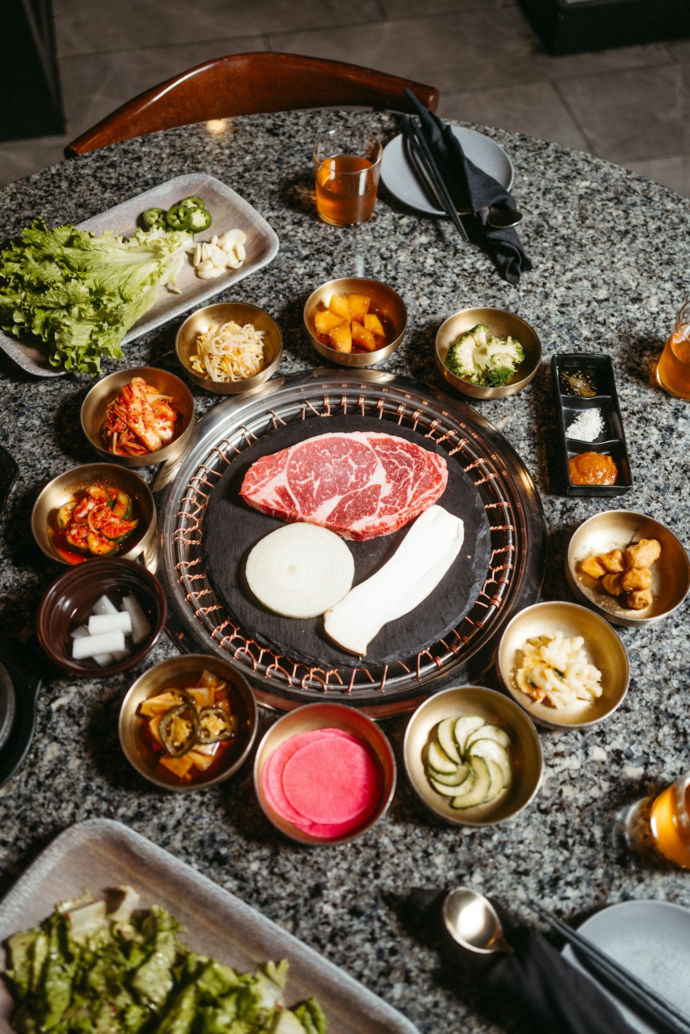 a table topped with lots of different types of food