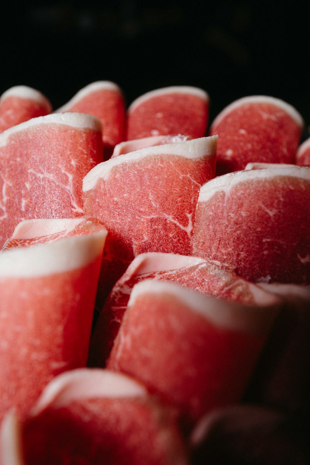 a close up of a bunch of watermelon pieces