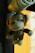 a stuffed monkey hanging from a light fixture