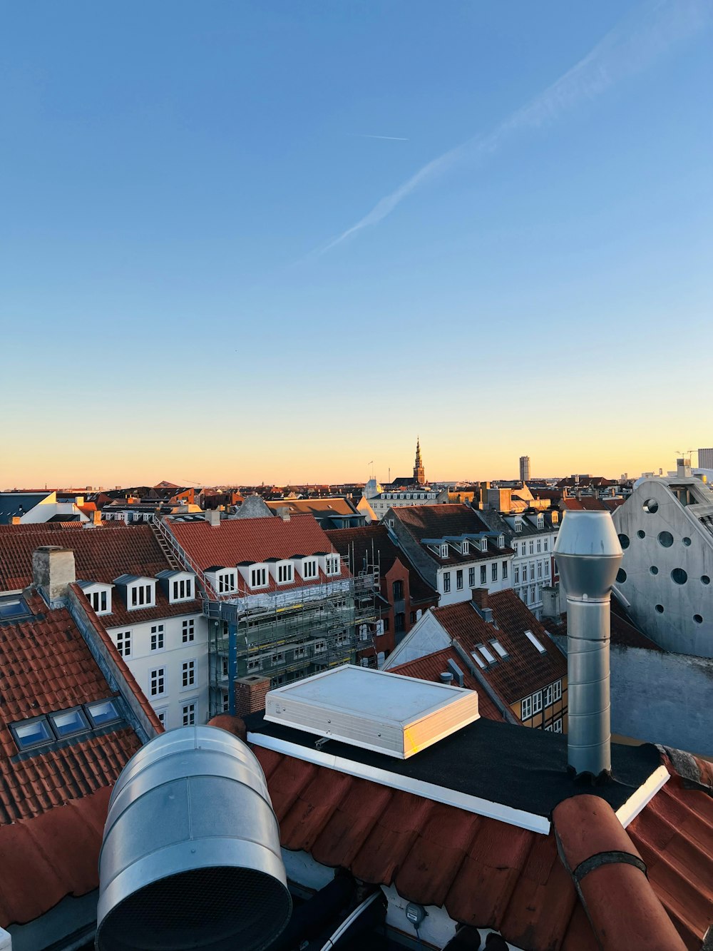 a view of a city from the roof of a building