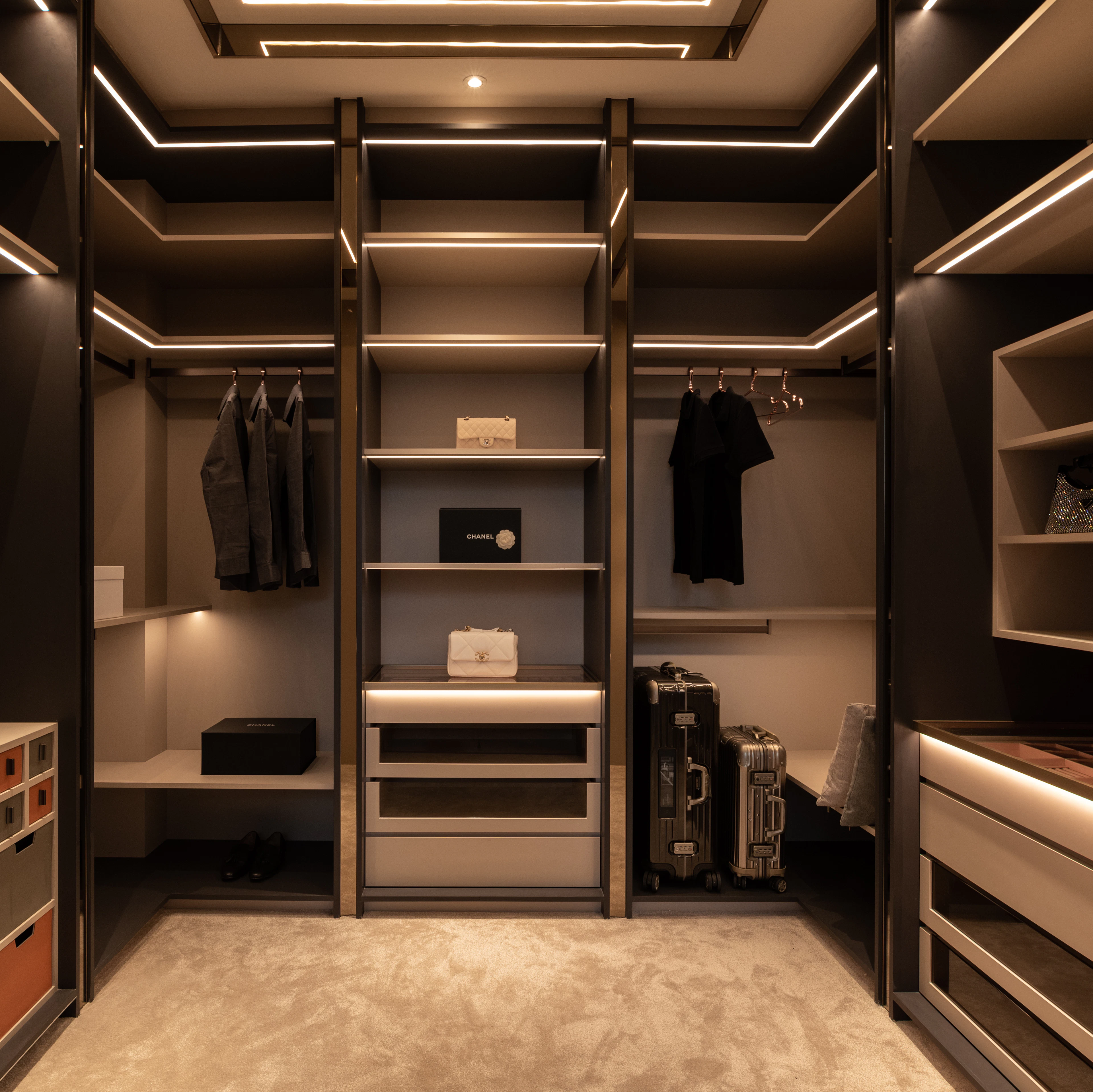 Walk-in closet with integrated lighting and open shelving