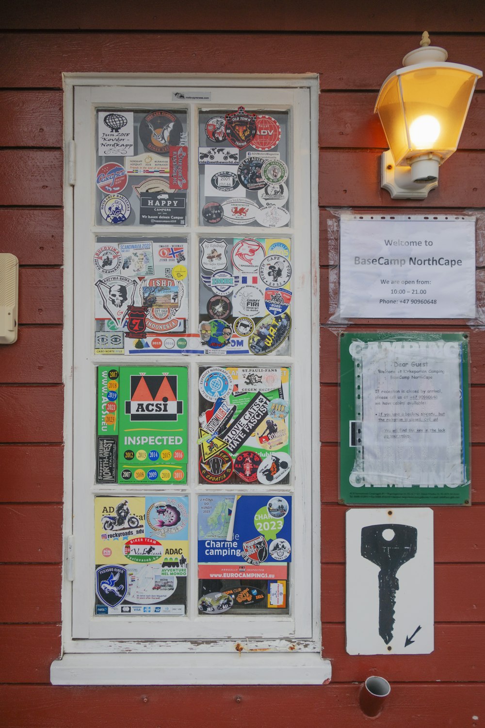 a door with a bunch of stickers on it