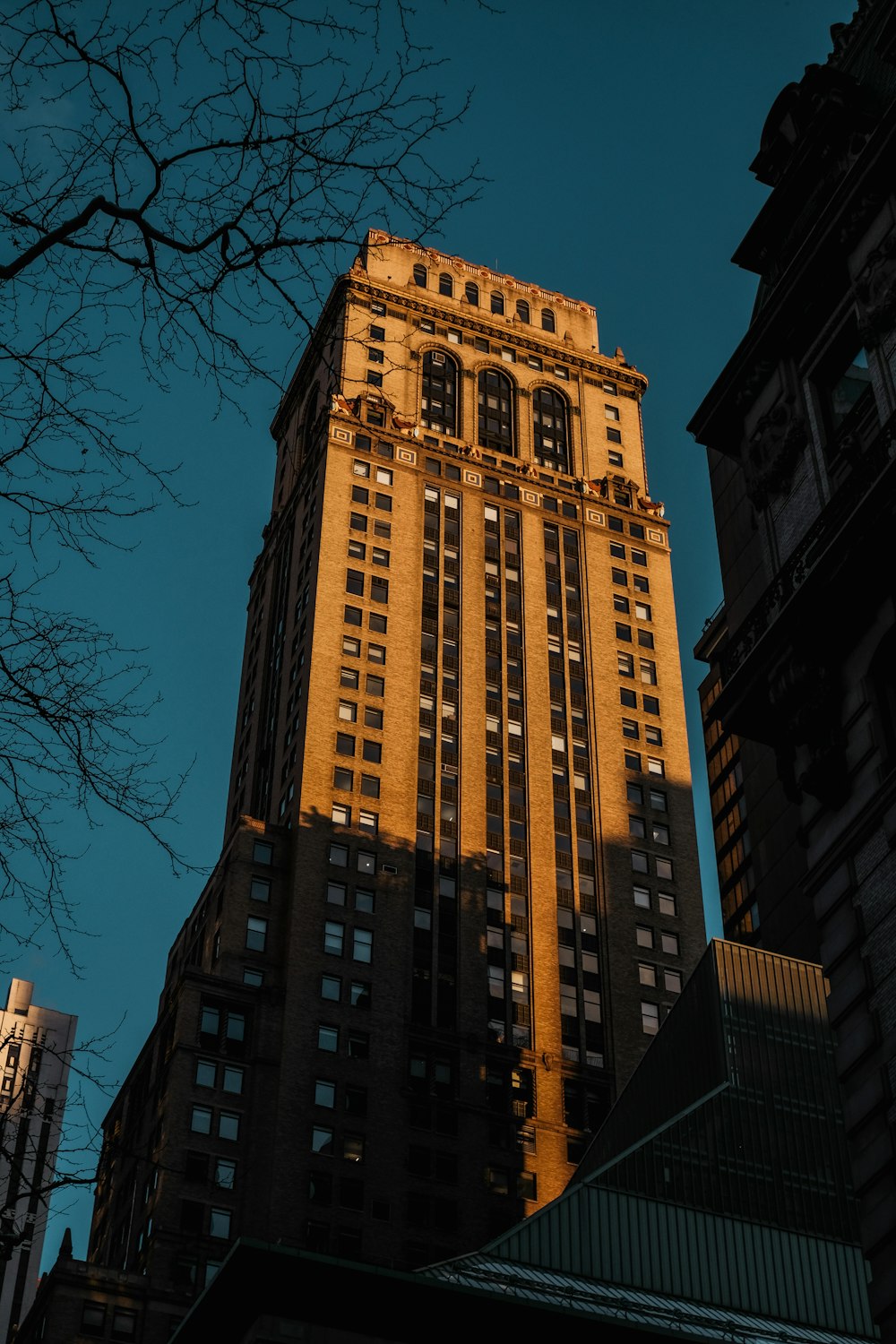 a tall building with a clock on the top of it