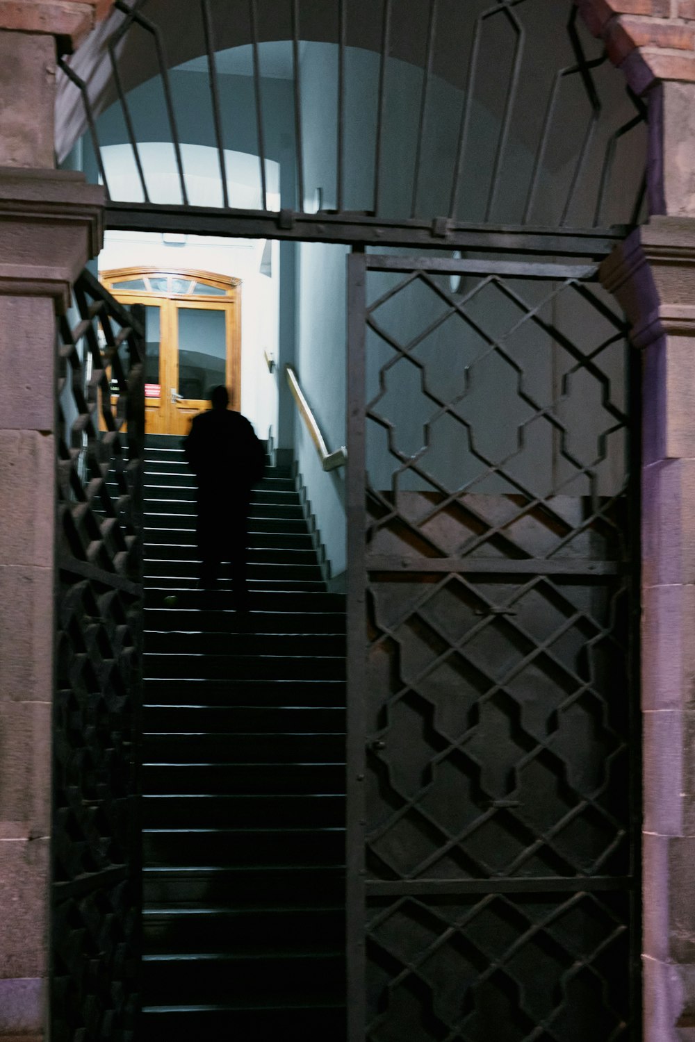 a person walking up a set of stairs