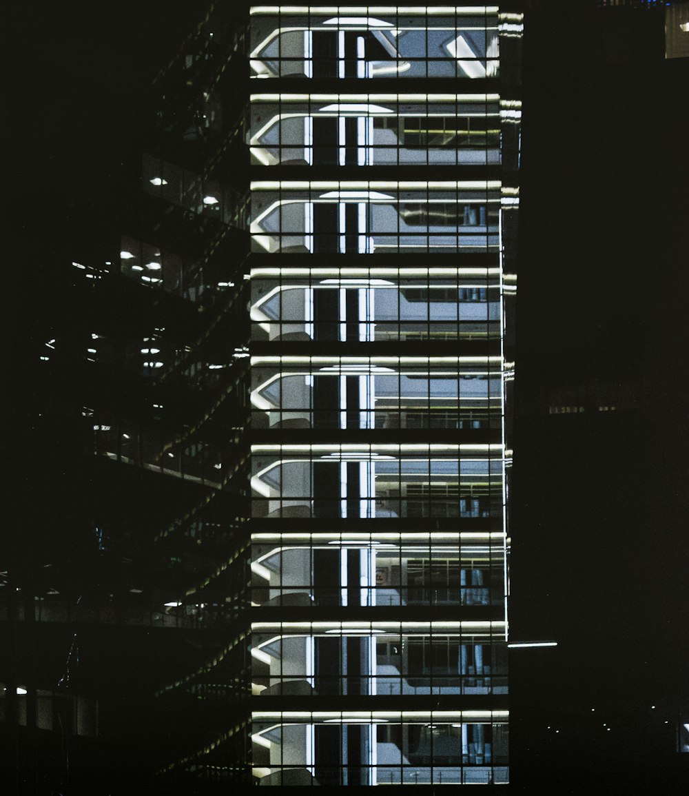 a very tall building lit up at night