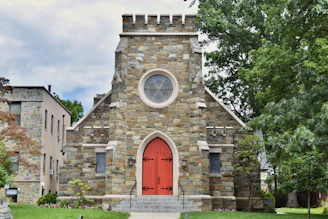 a church with a red door and a red door