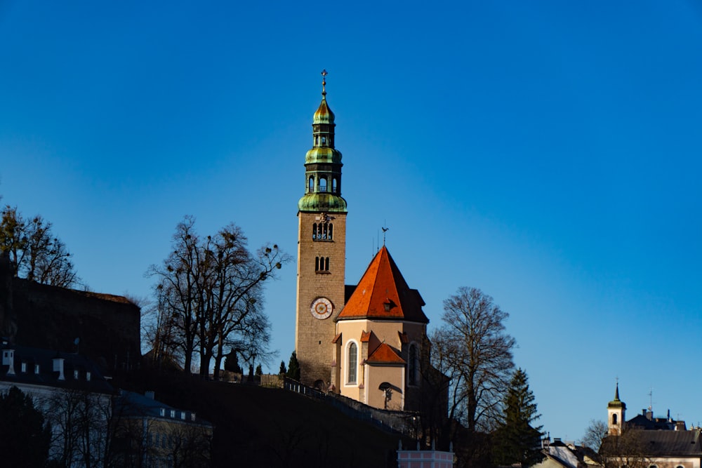 a tall tower with a clock on top of it