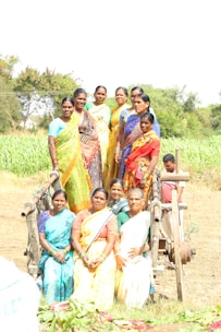 a group of women standing next to each other