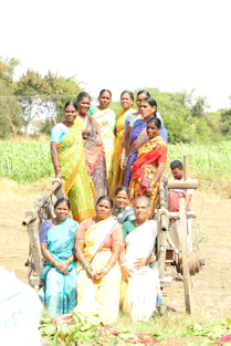 a group of women standing next to each other