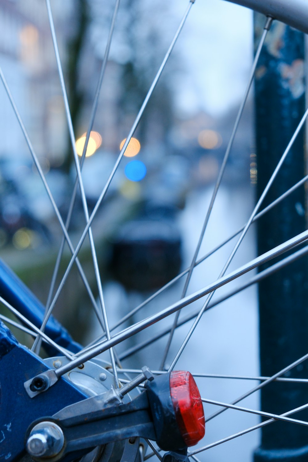 a close up of the spokes of a bicycle