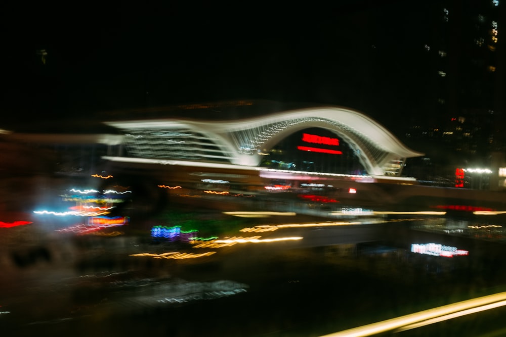 a blurry photo of a city at night