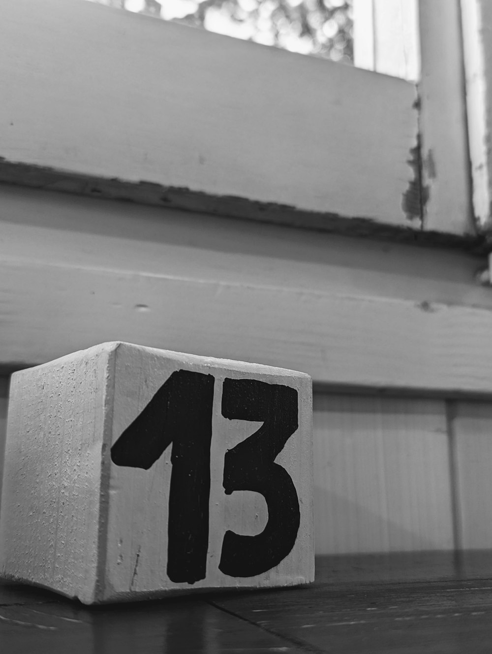 a block with the number thirteen on it