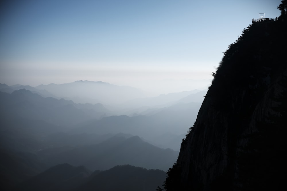 a person standing on top of a mountain