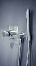 a shower head with a hose attached to it