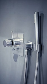 a shower head with a hose attached to it