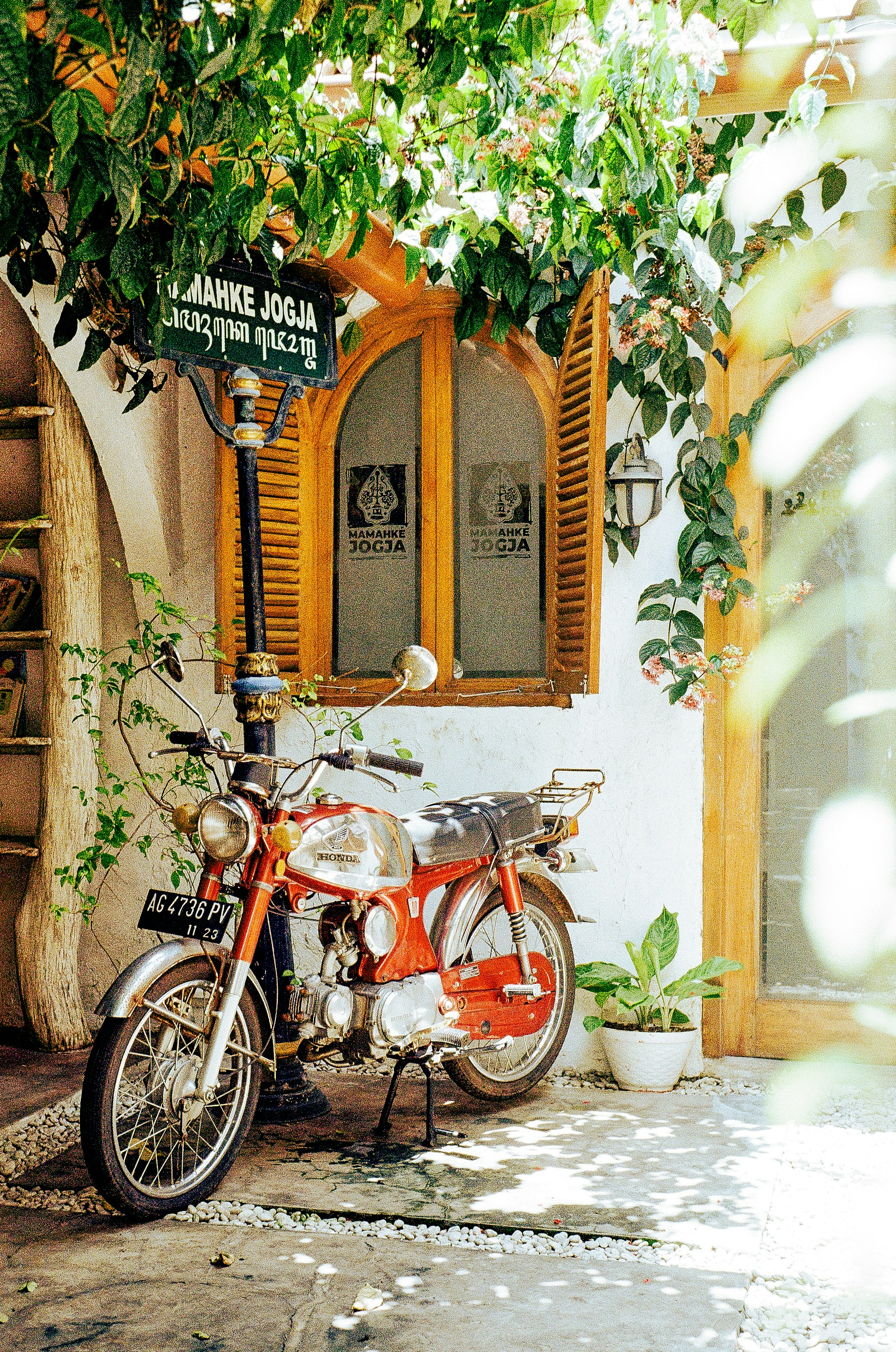 a motorcycle parked in front of a building