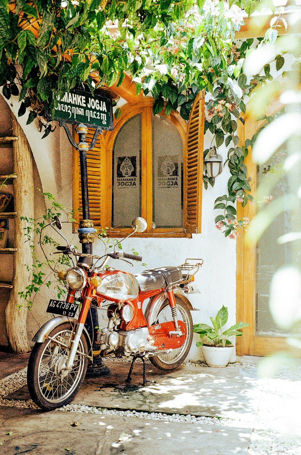 a motorcycle parked in front of a building