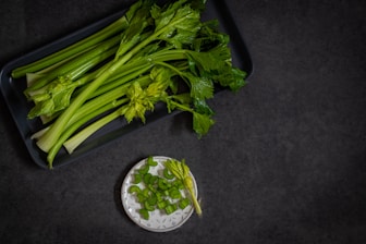 a bunch of celery sitting on top of a table